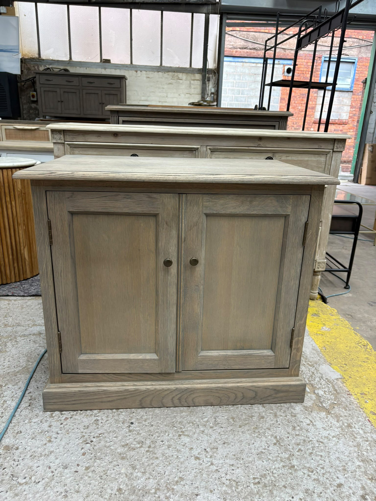 Rustic Oak 2-Door Cabinet with Brass Knobs